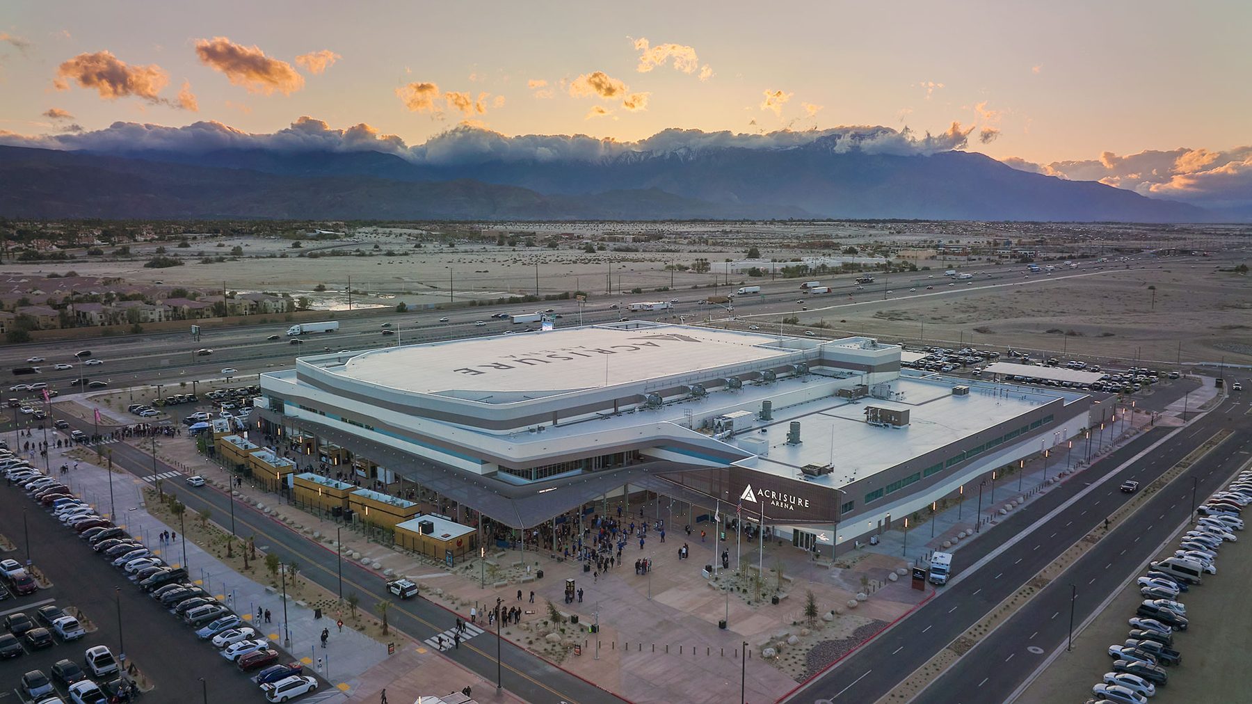 Acrisure Arena exterior at dusk