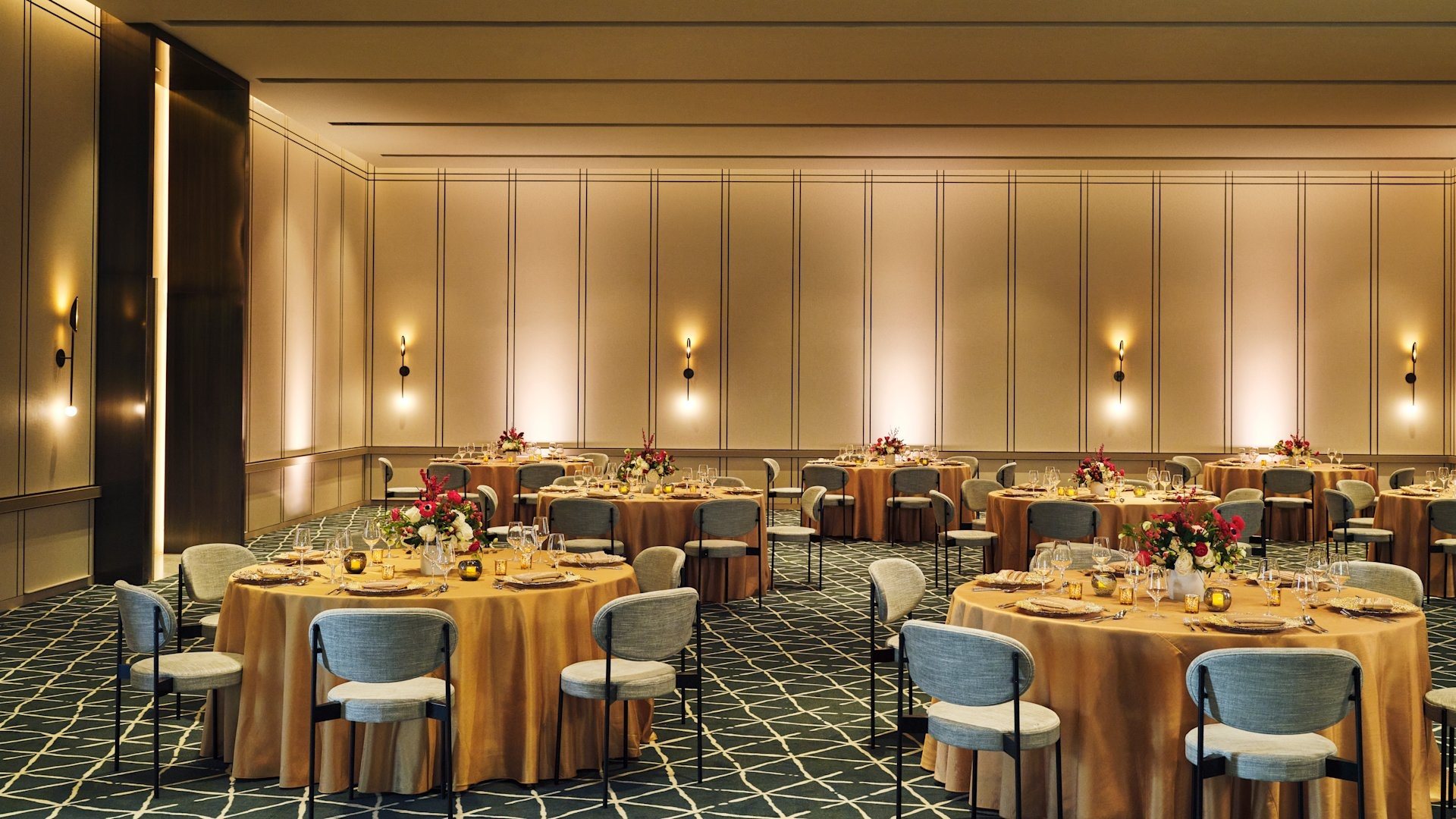 The Grand Park Ballroom at Conrad Los Angeles set for an event with round tables