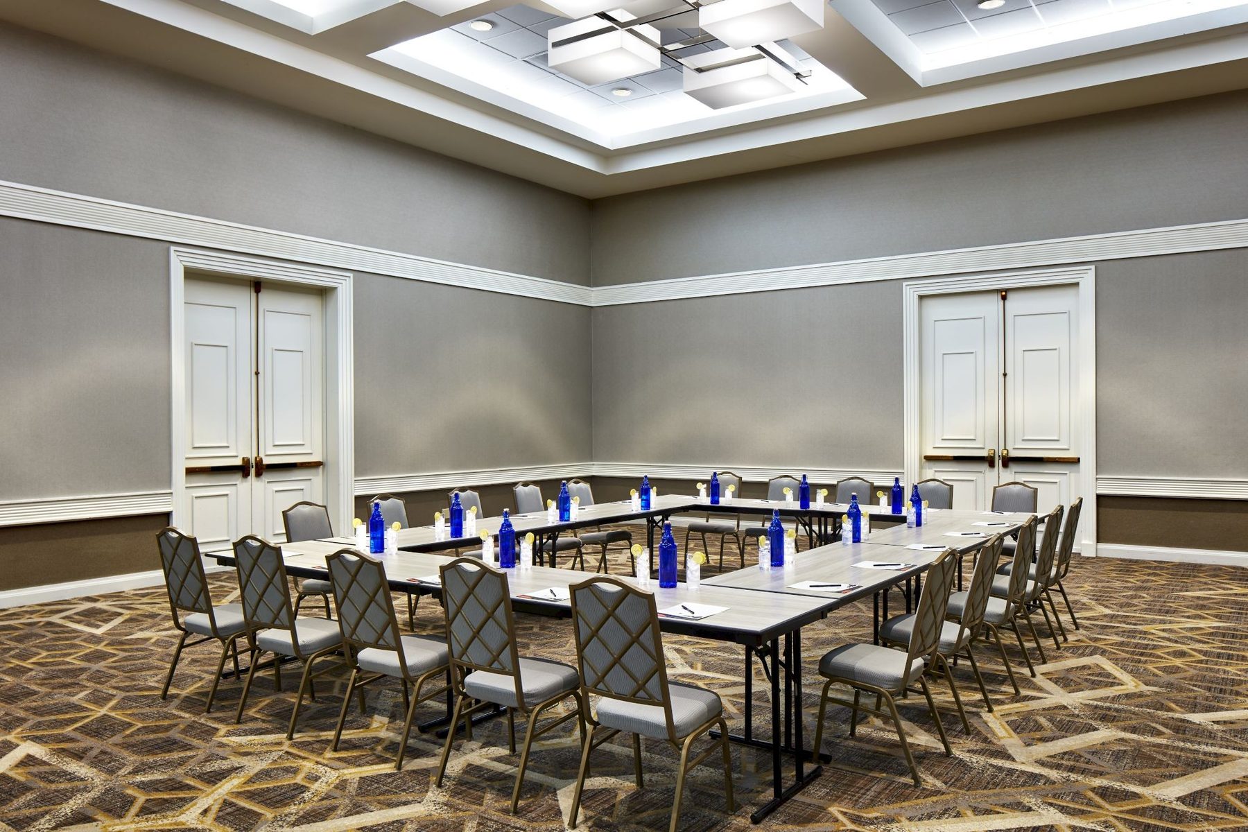 Mesquite Ballroom hollow-square setup at DoubleTree Golf Resort Palm Springs — leftover interior, not a Canyon Suites plate
