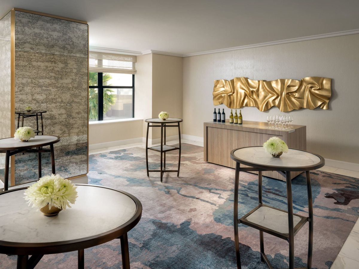 Abalone at Fairmont Breakers Long Beach, with natural light and high-top tables