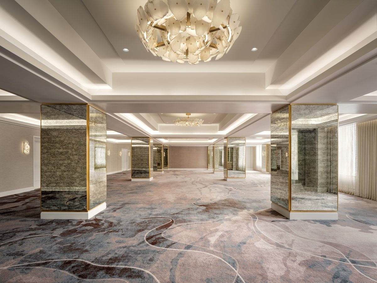 The Poseidon Ballroom at Fairmont Breakers Long Beach under its statement chandelier
