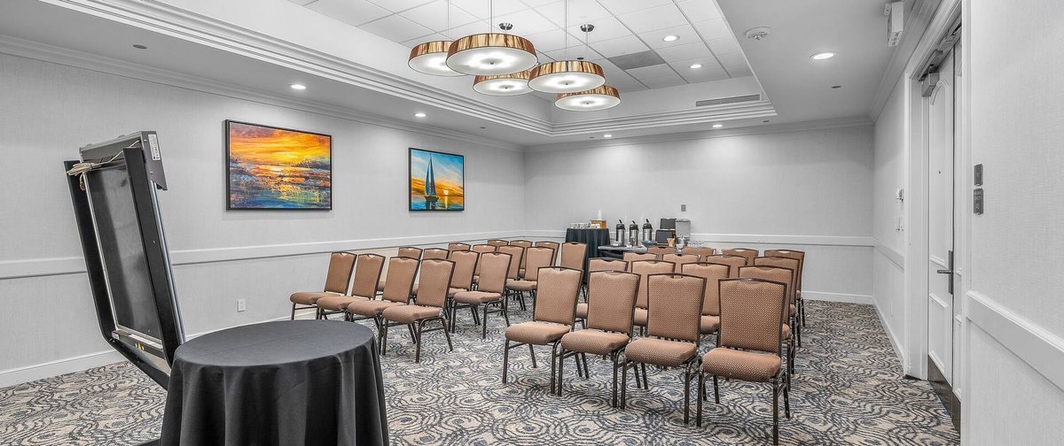 The Equestrian meeting room at Hilton San Diego/Del Mar set theater style with a presentation stand
