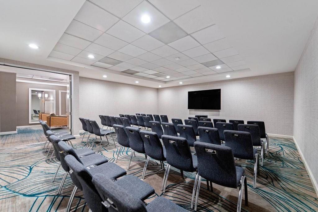 Cabrilla at Hyatt Centric Delfina Santa Monica set classroom-style facing a wall display