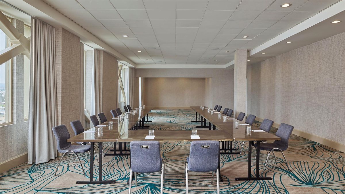 Lucina at Hyatt Centric Delfina Santa Monica set with long conference tables