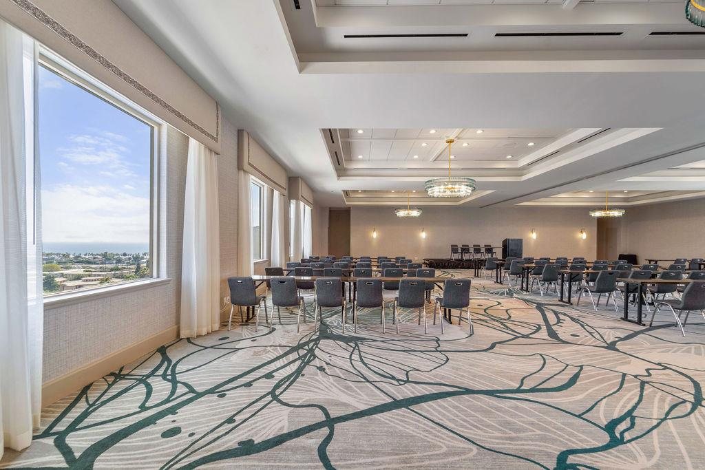 Luna at Hyatt Centric Delfina Santa Monica set classroom-style beside floor-to-ceiling windows