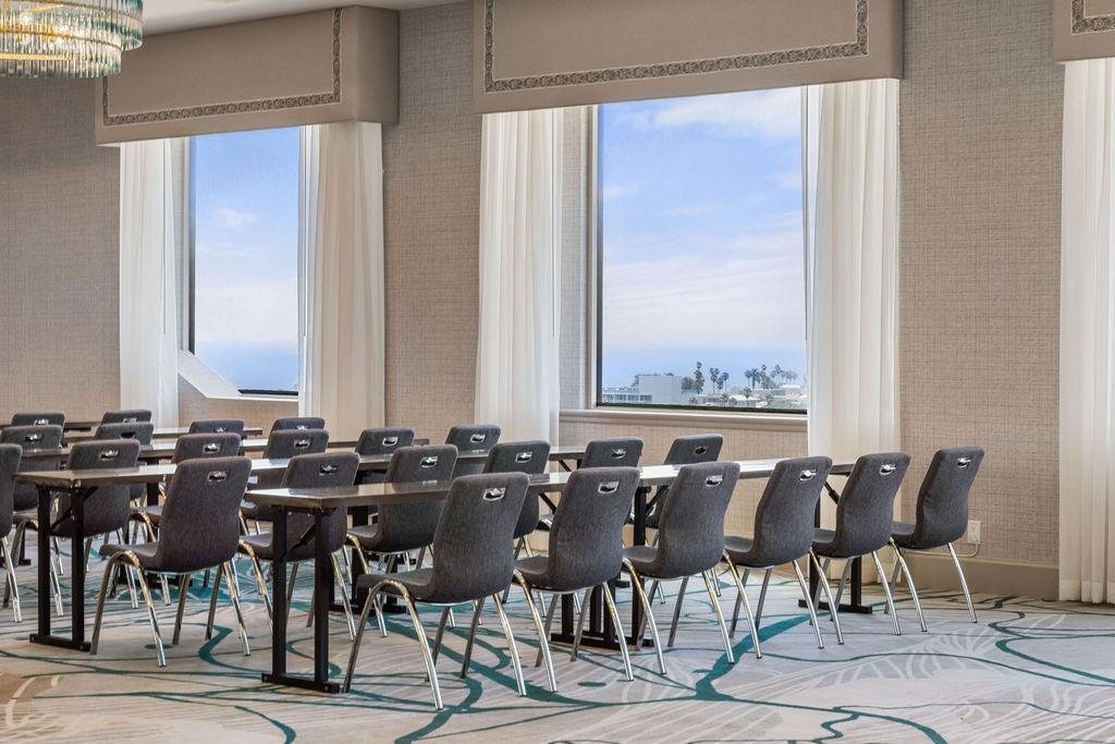 Stella at Hyatt Centric Delfina Santa Monica set classroom-style with ocean-facing windows