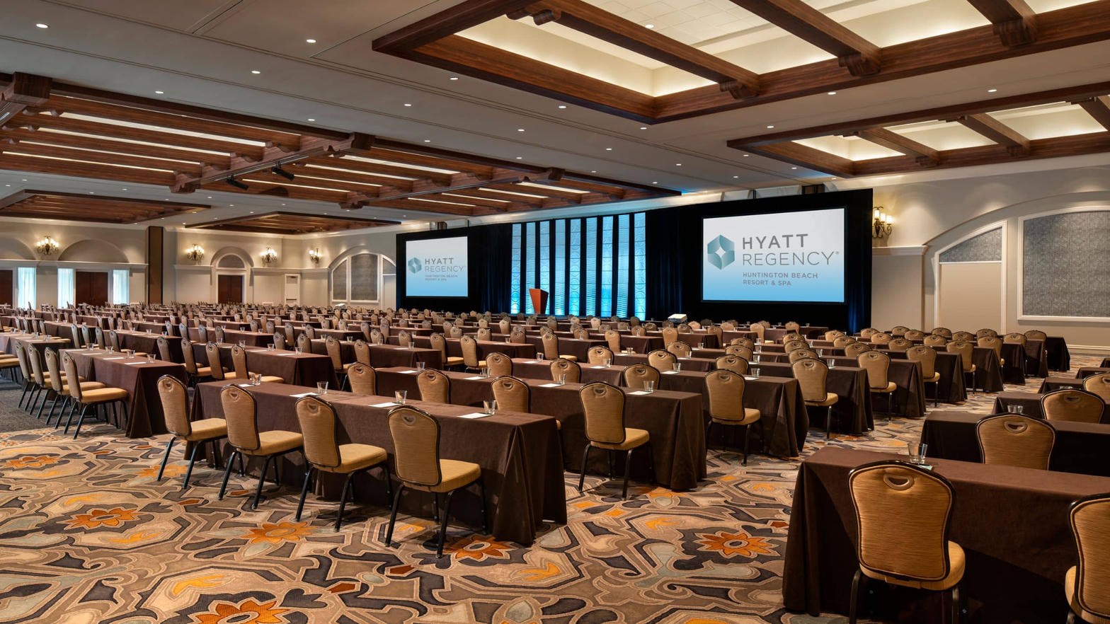 Hyatt Regency Huntington Beach ballroom classroom setup with dual screens