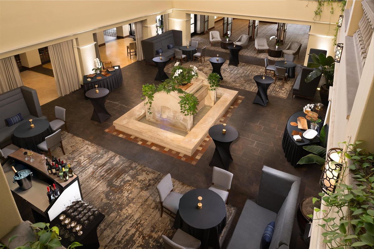 The skylit Atrium at Hyatt Regency Westlake with lounge seating