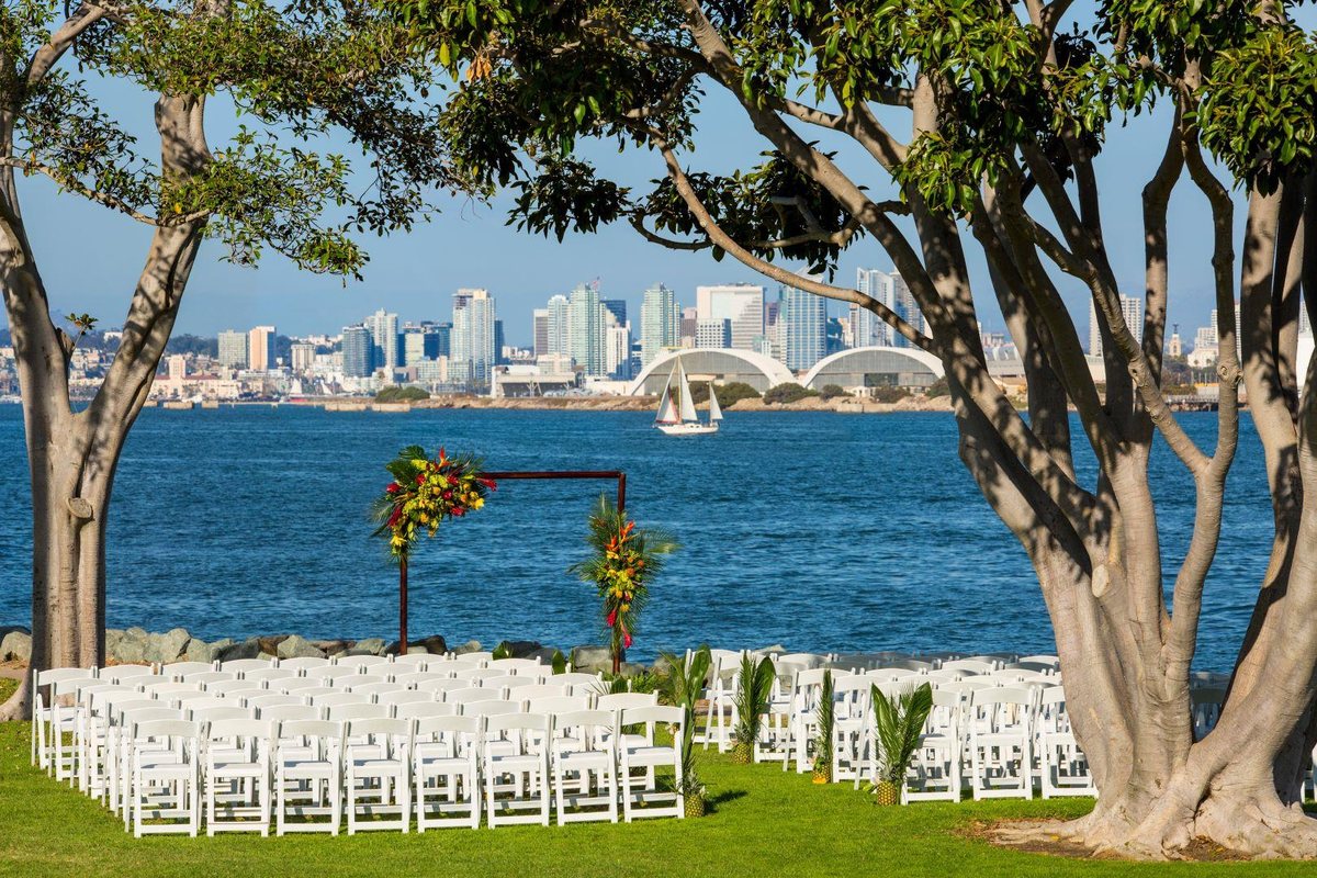 Skyline Park at Kona Kai San Diego Resort set for a ceremony with the San Diego skyline across the bay