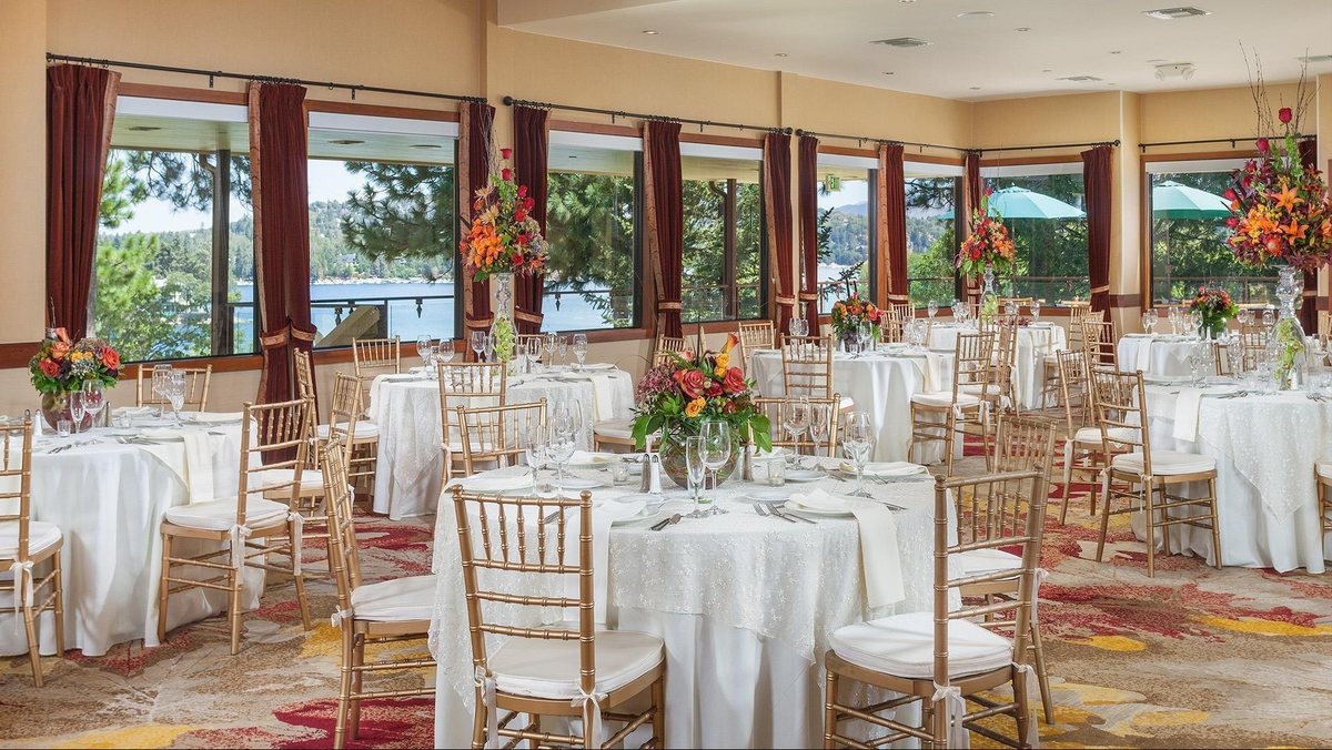 Lakeview Terrace at Lake Arrowhead Resort and Spa set for a banquet beside windows facing the lake