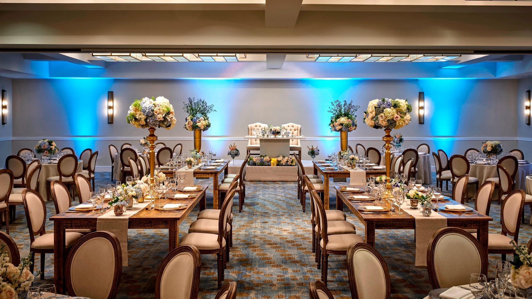 Academy Ballroom wedding setup at Los Angeles Marriott Burbank Airport — leftover interior, not a BUR shuttle plate