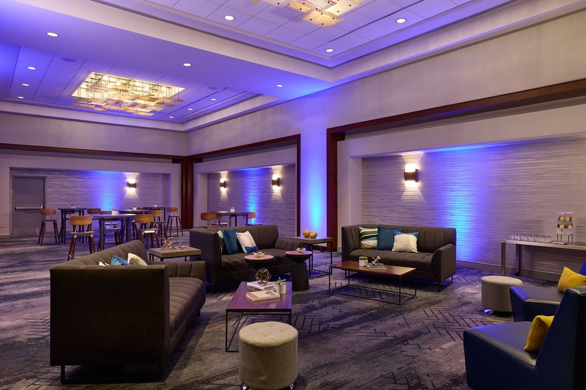 The Renaissance Ballroom at Renaissance Los Angeles Airport Hotel with lounge seating and blue uplighting