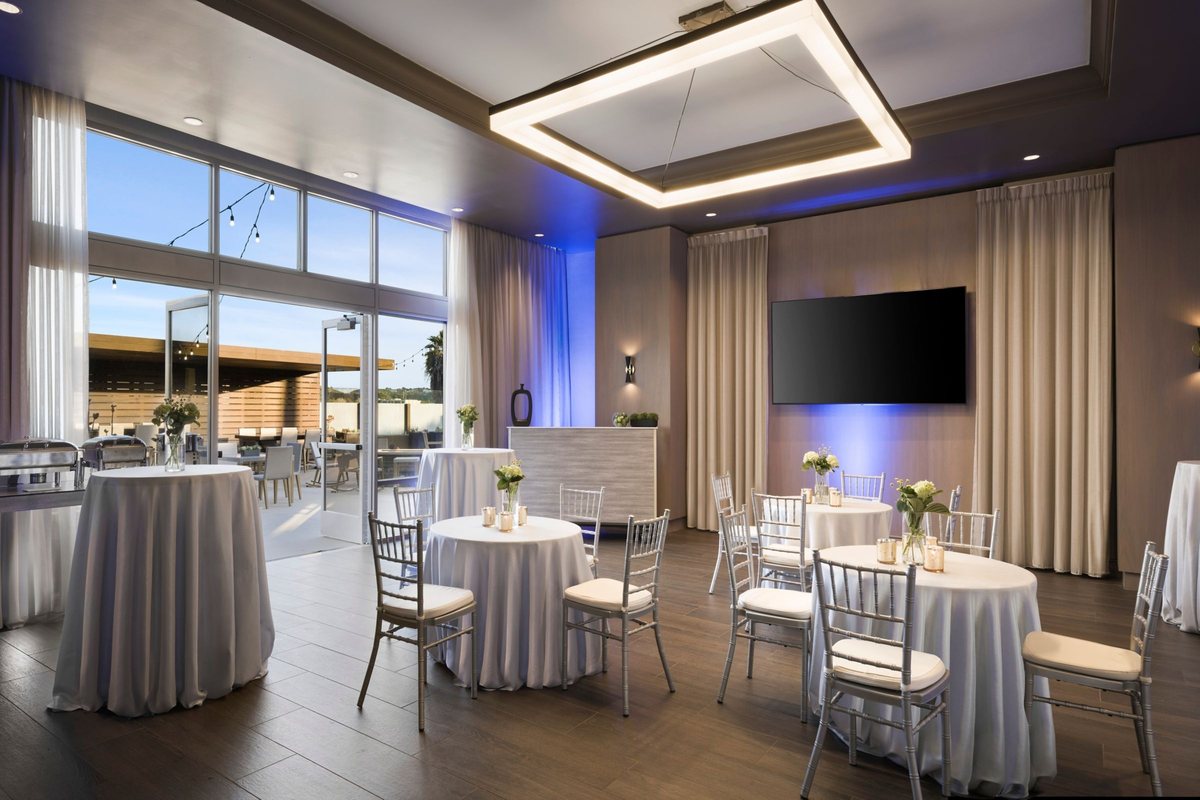The Pacific Room at San Diego Marriott Del Mar set with round tables