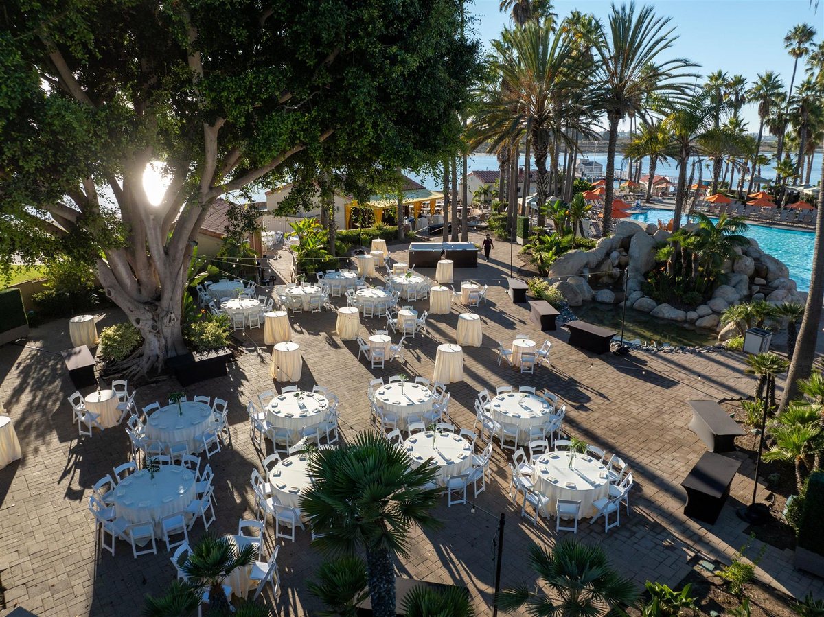 The Bayside Terrace at San Diego Mission Bay Resort with a waterfall and tropical landscaping