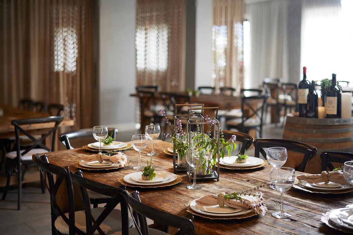 Tables set for dinner in SOL at Sonesta Redondo Beach & Marina