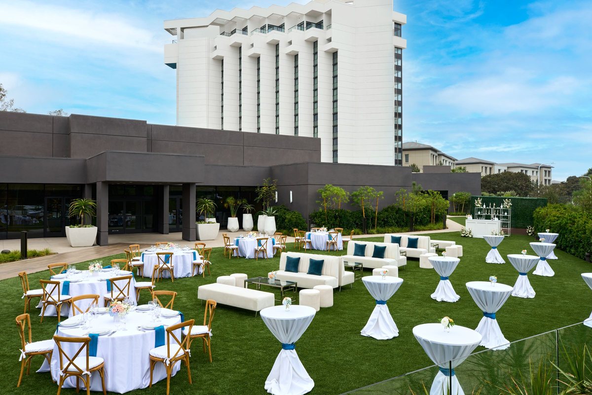 Riviera Lawn set for a reception with lounge furniture and cocktail tables