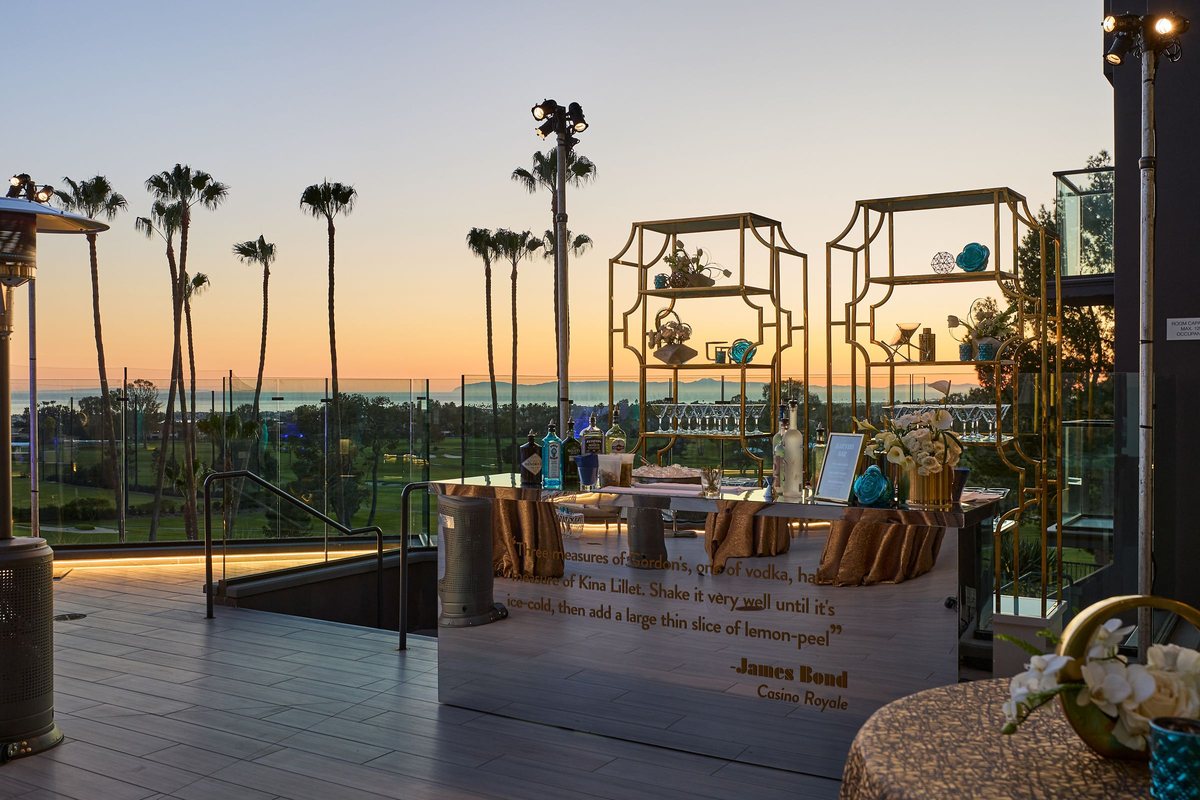Marea Terrace at sunset with lounge seating and the Pacific behind